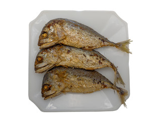 Fried mackerel on the plate.