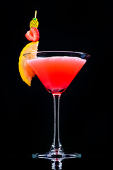 classic pink panther cocktail with reflection on dark background