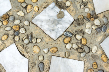 Stone walkway in the outdoor garden. Path of plated stones on gravel in garden park. Meditative stone walkway. garden architecture. For your background or product.