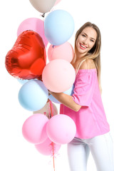 Beautiful young woman with air balloons on white background