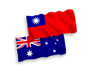 National vector fabric wave flags of Australia and Taiwan isolated on white background. 1 to 2 proportion.