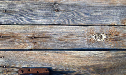 Old doors knocked down from dark boards