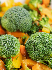 raw broccoli salad with bell peppers and carrots