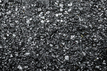 Background texture of rough asphalt Dark black Asphalt surface,top view.