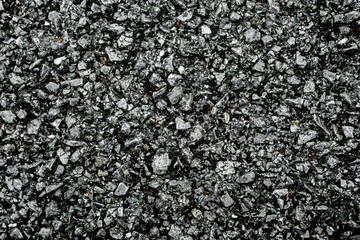 Background texture of rough asphalt Dark black Asphalt surface,top view.