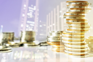 Concept of currency trading, making a decision for an optimal gain. Graph and rows of coins for finance and business concept.