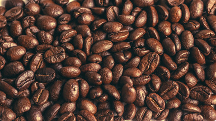 coffee bean background. Roasted coffee beans closeup. macro photo of coffee beans.