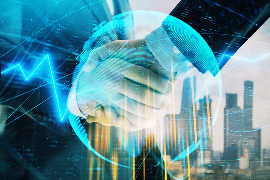 Double exposure of financial chart and world map on cityscape background with two businessmen handshake. Concept of international investment
