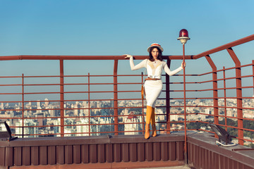 Stylish young girl in an autumn look