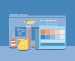 website under construction with desktop computer