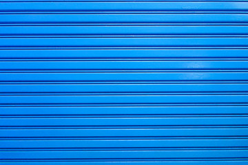 Security roller shutter door by stanless steel blue color of industrial factory building for...