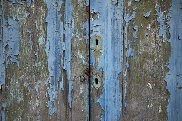 detail of an old blue wooden portal
