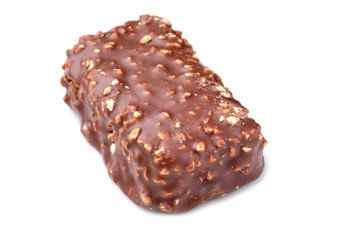 Chocolate candy with nuts close up.