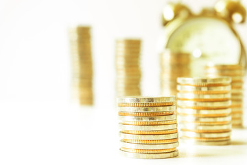Coins stacked on each other in different positions. Saving money and account finance bank business concept. Business Finance and Money concept,Save money for prepare in the future.time is money concep