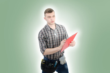 Engineer. Young attractive guy and tools.