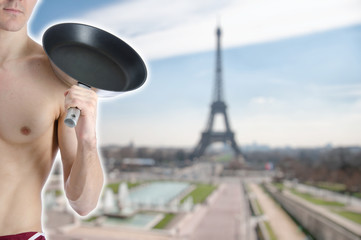Young attractive guy in the kitchen.