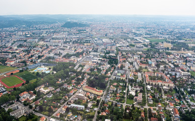 Fototapeta na wymiar City Graz aerial view with district Eggenberg and swimming pool