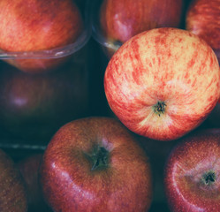 Fresh red apples close up at the market. Healthy food background concept