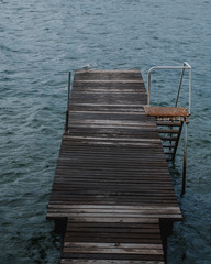 Fototapeta premium Private old wooden pier on a lake