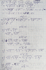 Fototapeta premium School notebook in a cage with a mathematical solution to the problem.