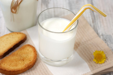 Ayran, homemade yogurt drink kefir, lassi - healthy summer refreshing cold drink on blue table.