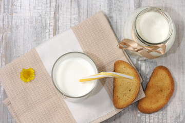 Ayran, homemade yogurt drink kefir, lassi - healthy summer refreshing cold drink on blue table.Top view