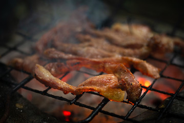 Pork roast on a hearth near the smoke
