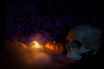 halloween background with skull and pumpkin