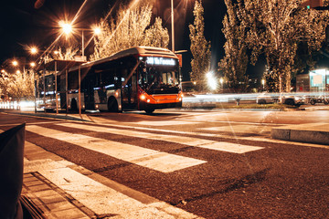 Fototapeta premium Traffic trails along bus station on Barcelona