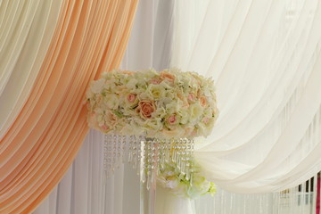 Festive table decoration with flowers at a wedding exhibition