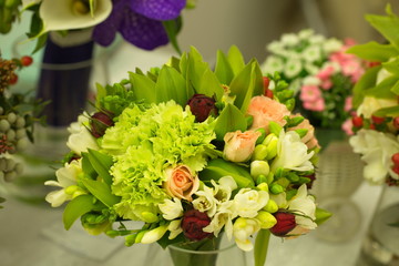 Festive table decoration with flowers at a wedding exhibition