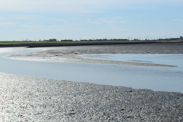 The Wadden Sea near Bensersiel, Northern Germany, at low tide - UNESCO World Heritage Site