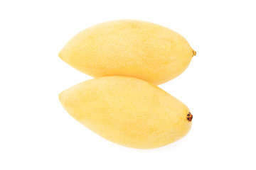 Closeup image of two yellow thailand mango isolated at white background.