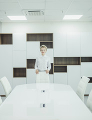 Portrait of a business woman in an office. 