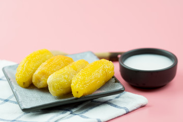 Thai style banana in syrup with coconut milk. Preserved banana with syrup
