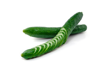 Water drops whole and sliced fresh Japanese cucumbers isolated on white background with clipping path