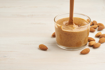 almond butter, raw food paste made from grinding almonds into nut butter, crunchy and stir, white...