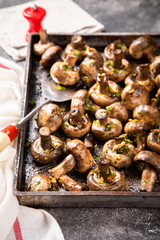 Baked champignons. Mushrooms in sauce. Hot appetizer. Fried vegetables.