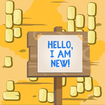 Word writing text Hello I Am New. Business photo showcasing introducing oneself in a group as fresh worker or student Wood plank wooden stick pole paper note attached adhesive tape empty space