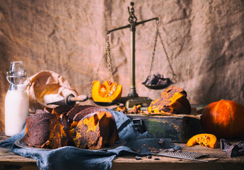 Fototapeta na wymiar Autumn cupcake with chocolate. Fragrant homemade cakes. Vintage background.Toned image