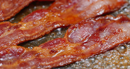 Cook with bacon on fry pan