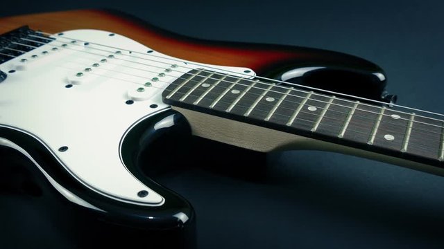 Electric Guitar Revealed Under Velvet Sheet