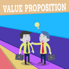 Word writing text Value Proposition. Business photo showcasing feature intended to make a company or product attractive Two White Businessmen Colleagues with Brief Cases Sharing Idea Solution