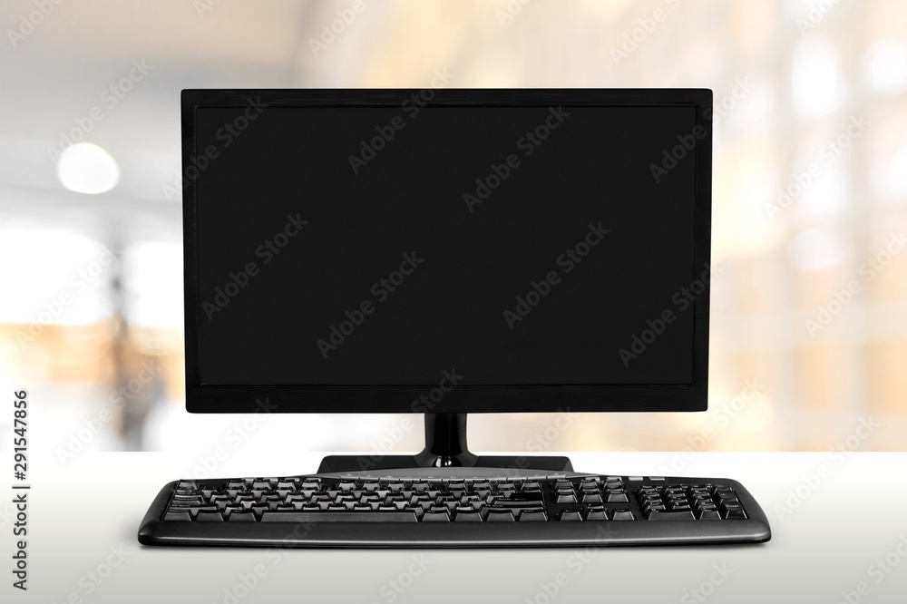 Poster desktop computer and keyboard on background