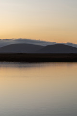 Sunset over a loch on the Hebridean Island of North Uist