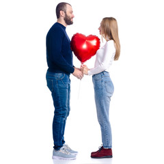 Beautiful romantic couple woman and man with red balloon shape heart on white background isolation Happy Saint Valentine's Day