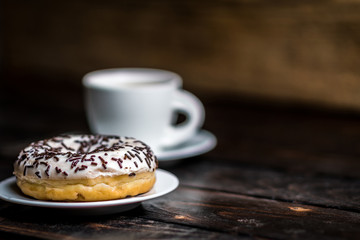 White donut with chocolate sprinkle