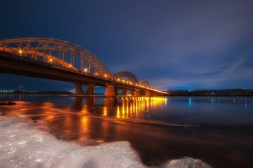 night city view, luminous  bridge. winter cityscape