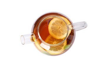 Glass teapot with lemon slices isolated on white background