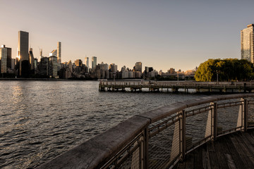 Long Island City Gantry sign and Manhattan midtwon skyline in front of east river